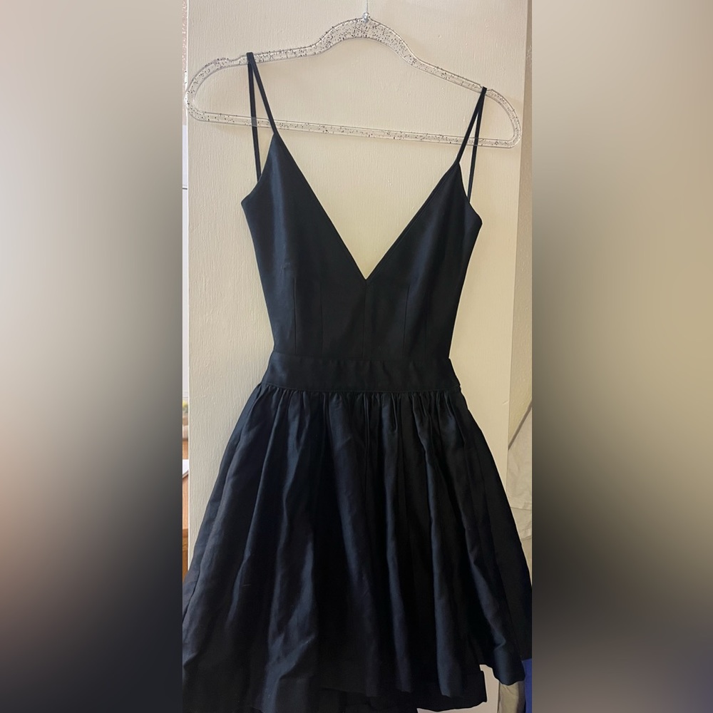 Contrarian NY black backless dress. NWT.
